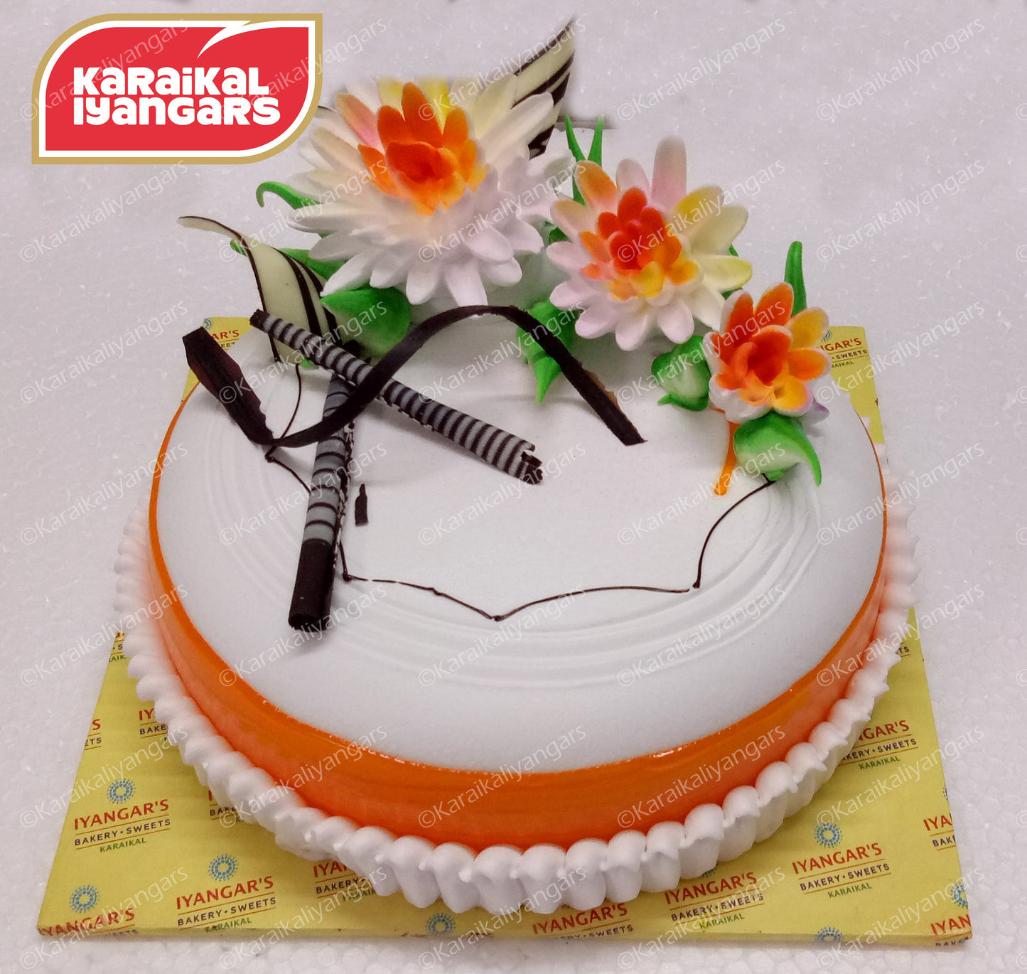 Dome shaped Orange Freshcream cake