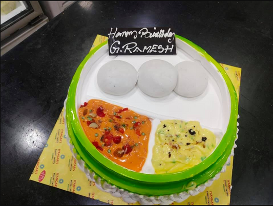 An Idly shaped cake for an Idly shop owner
